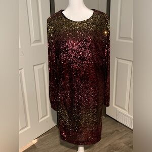 Very glittery dress long sleeves with zipper in back size 16